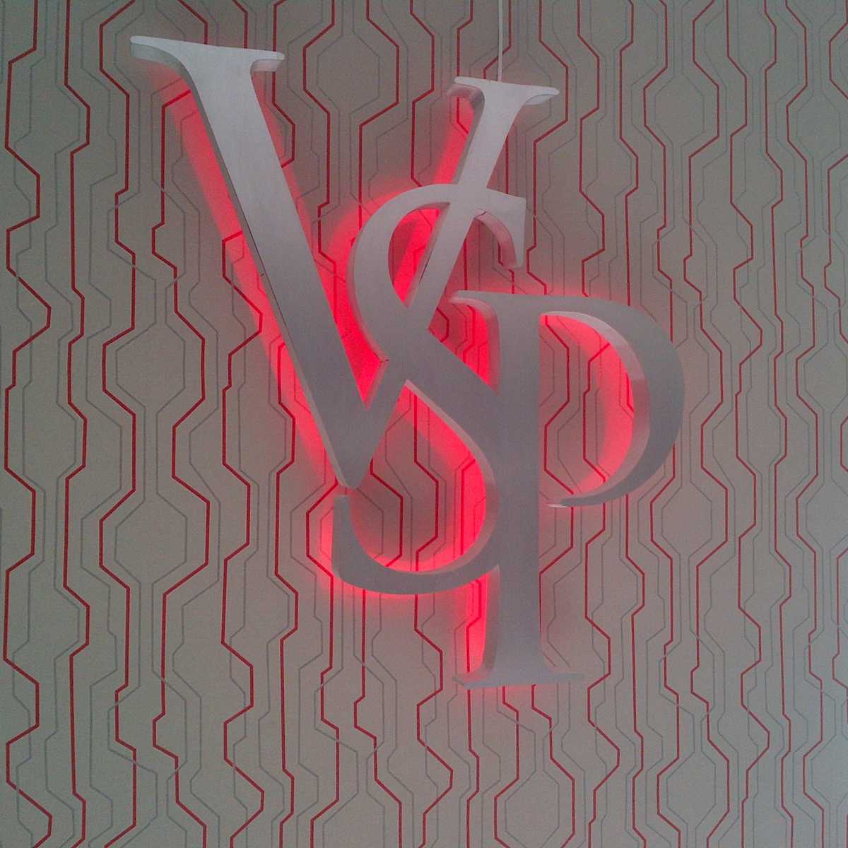 Halo-lit LED signage with illuminated glow behind letters
