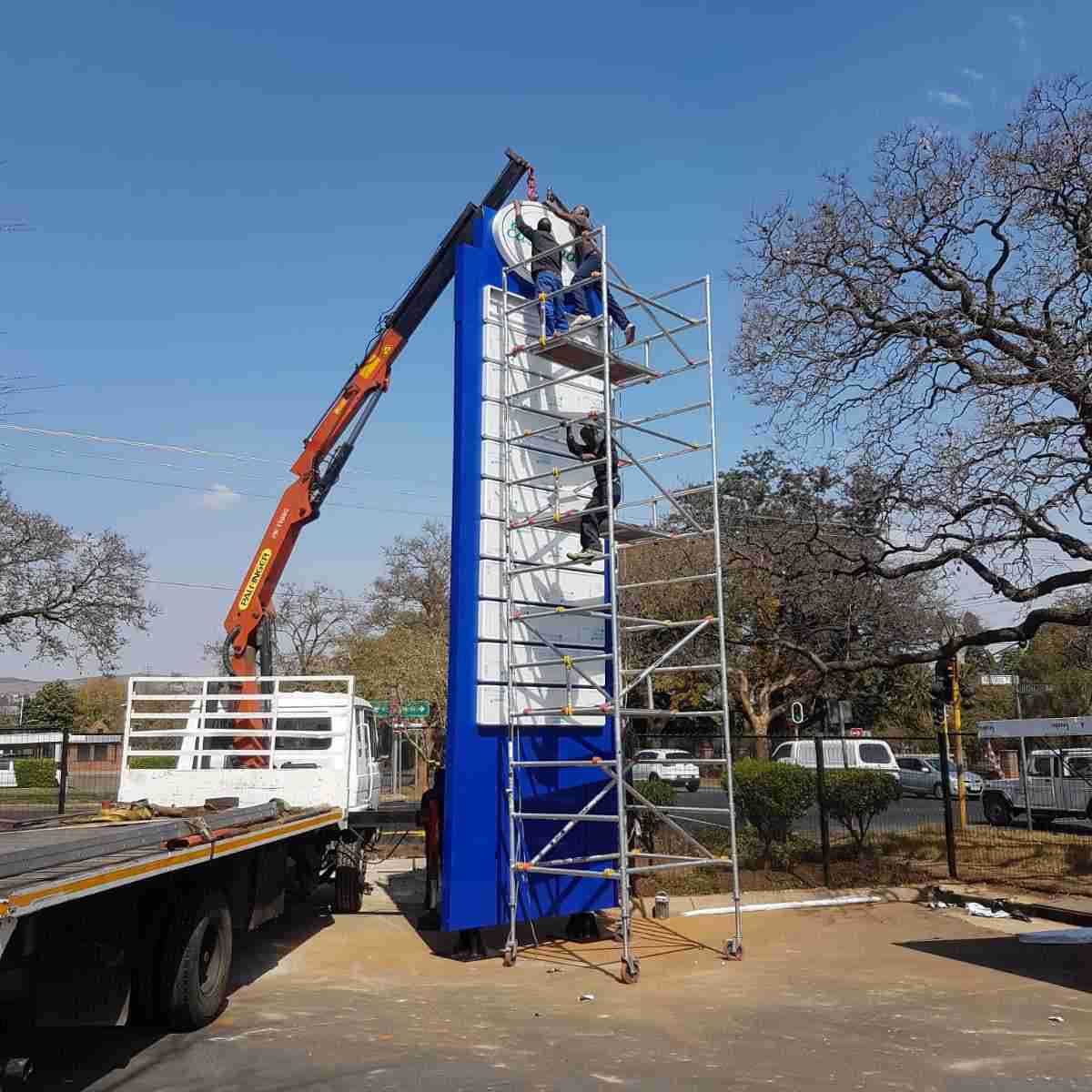 Shopping centre directory pylon sign being professionally installed